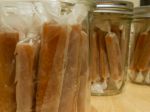 The caramel wrapped and placed in jars